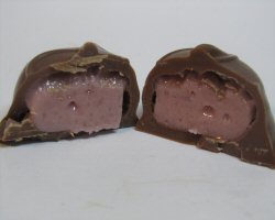 An opened raspberry cream